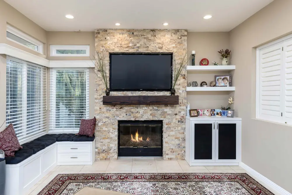 Small office set-up with fireplace and beautiful beige brickwork