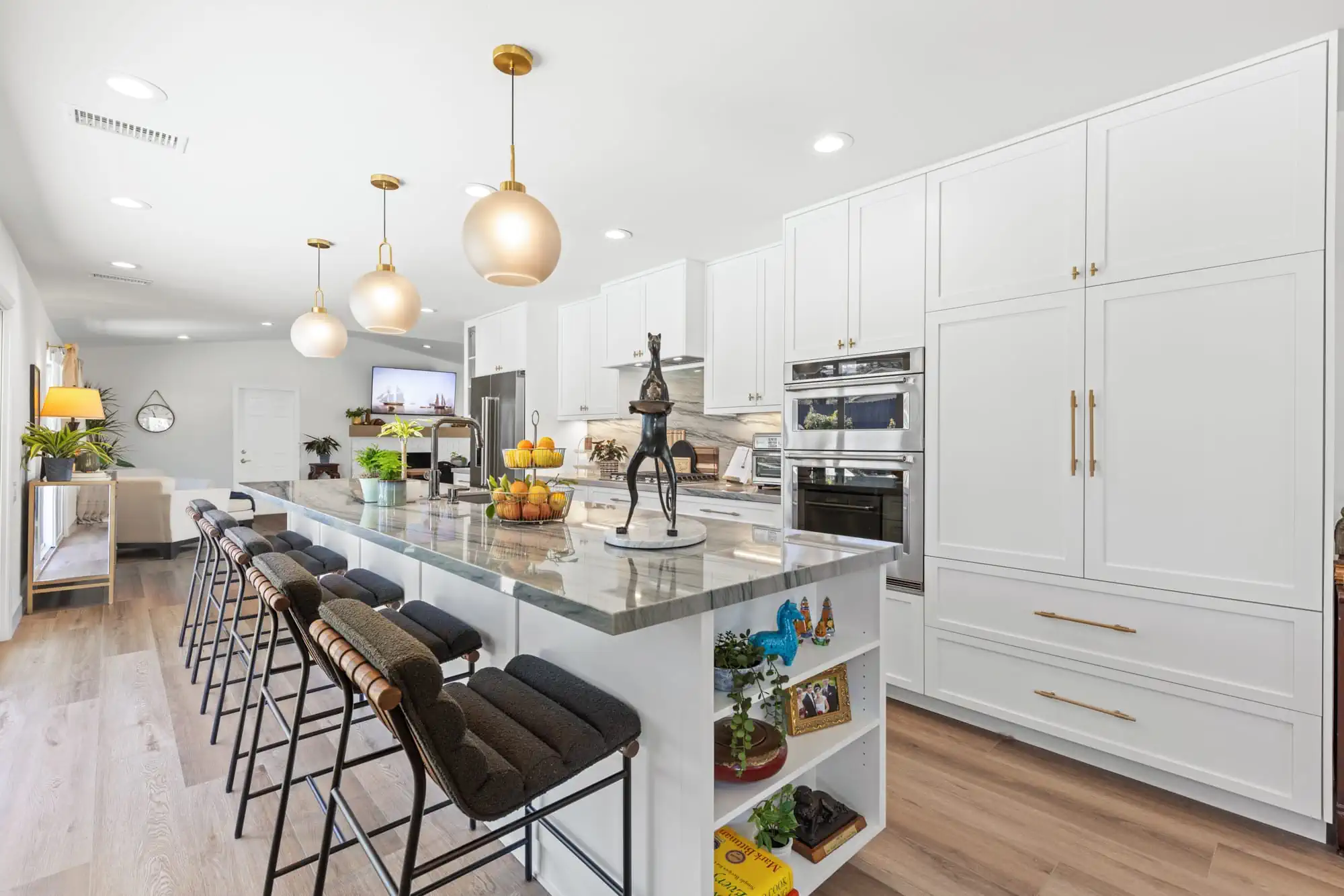 Modern Scripps Ranch kitchen with navy cabinets and sliding glass doors